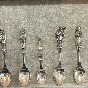 5 Reed and Barton assorted Christmas spoons